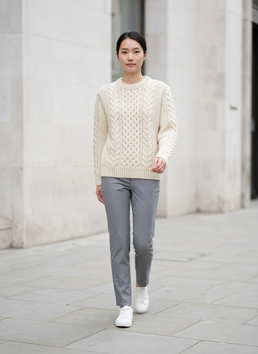 Cream chunky cable knit sweater, walking, outdoor daylight street