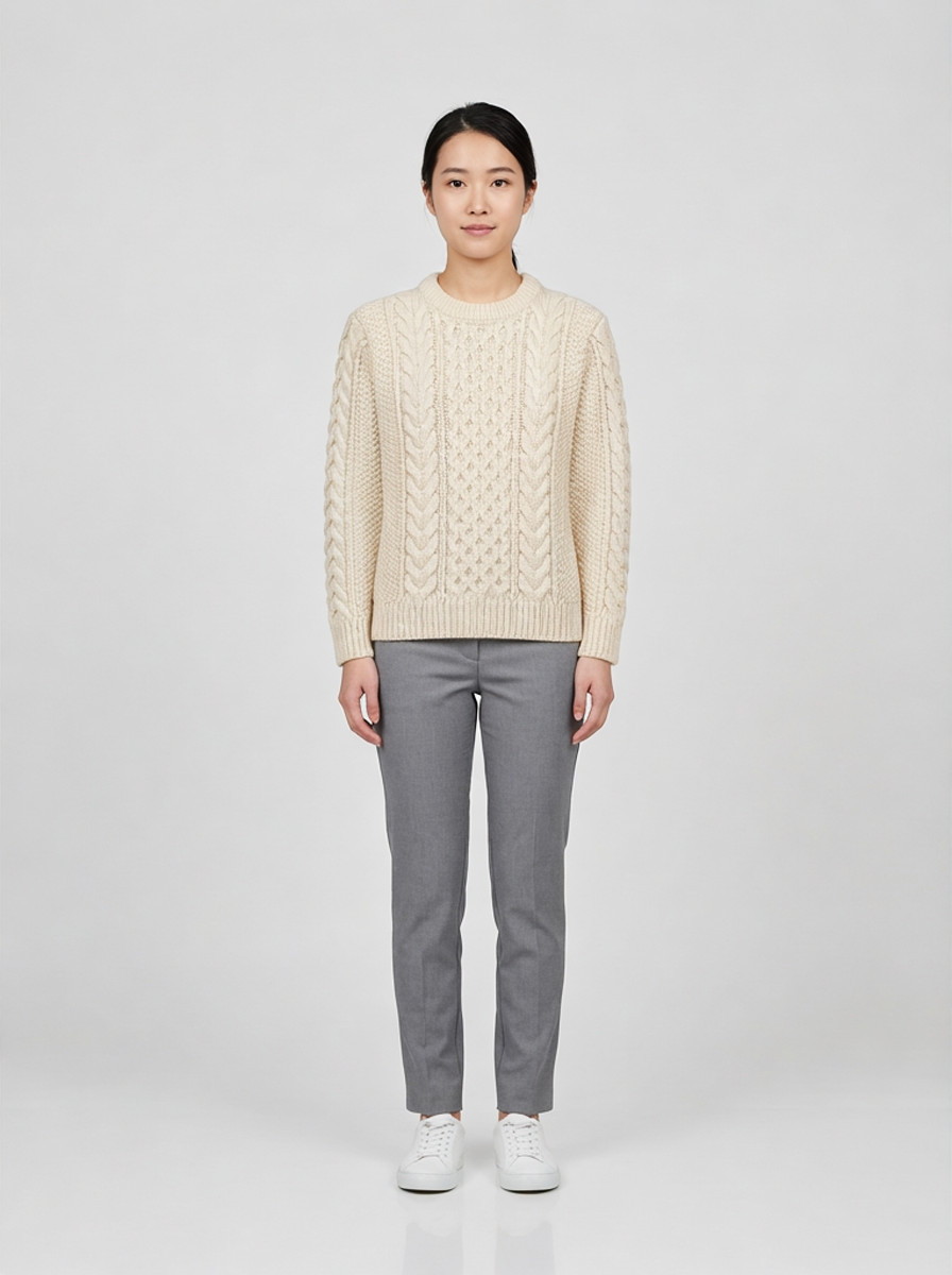 Cream chunky cable knit sweater, front view, studio packshot